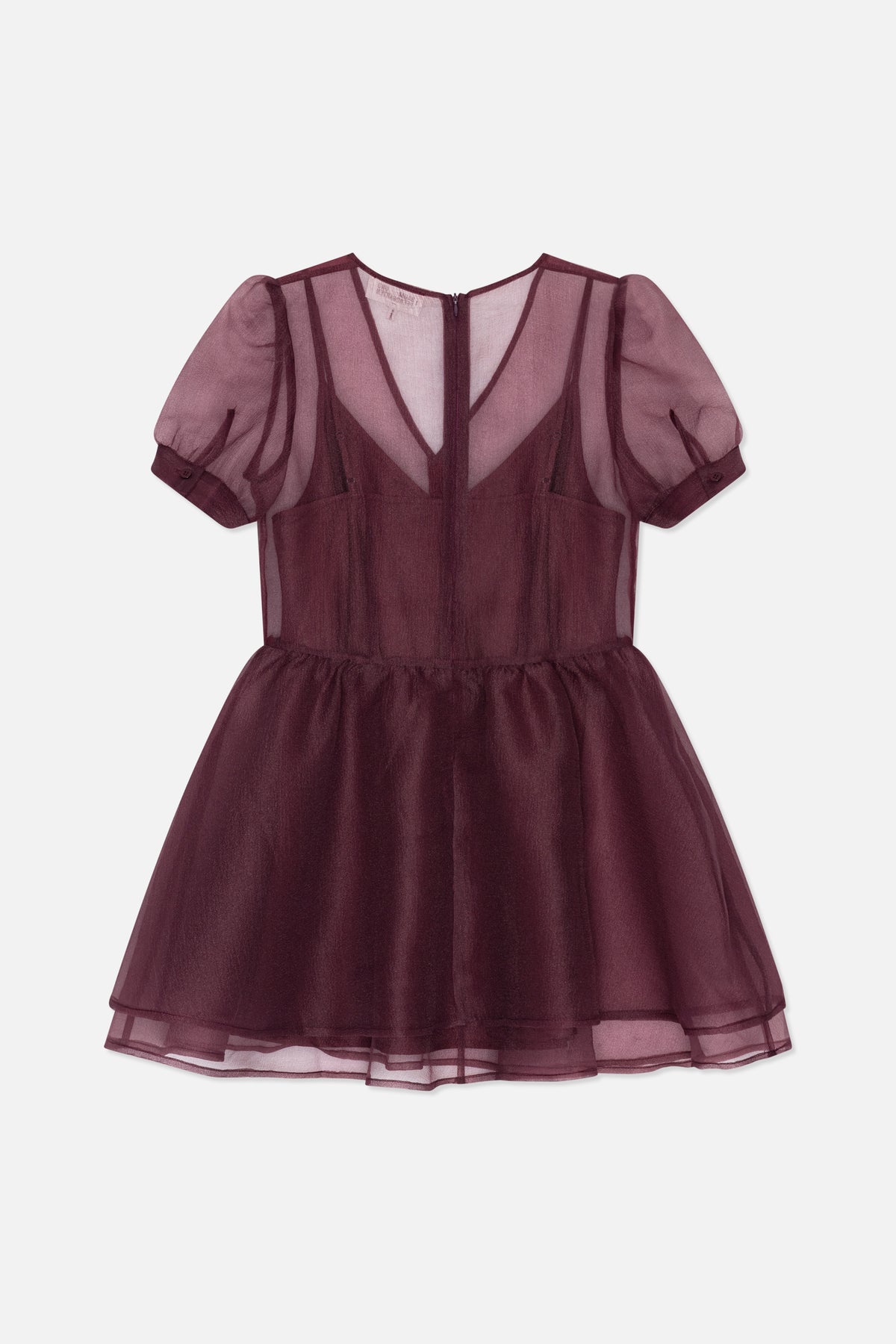 Back view of a burgundy sheer dress with short puff sleeves, a panelled bodice, gathered flared skirt and sheer layered hem.