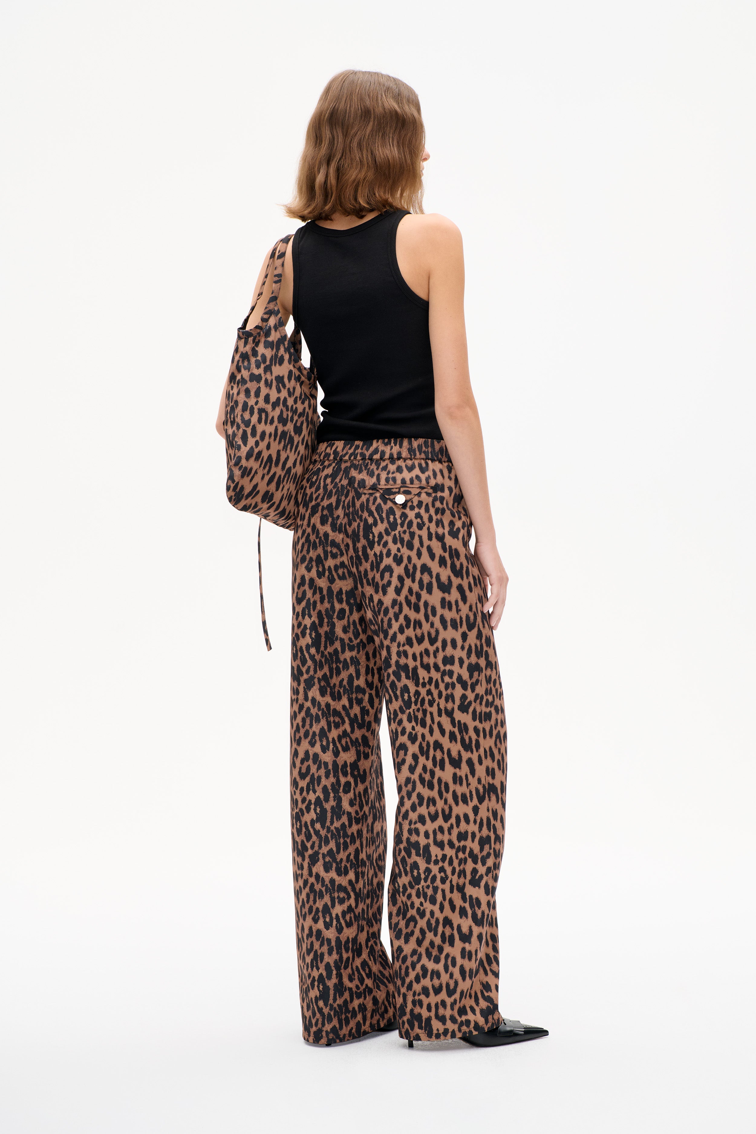 Shop NIVIA TROUSERS in Dark Brown Leopard | Fast Delivery
