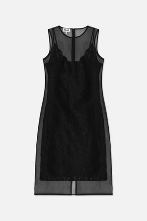 Front view of a black sleeveless dress with a sheer overlay, opaque slip lining, lace bust panels and a back zipper visible through the fabric.