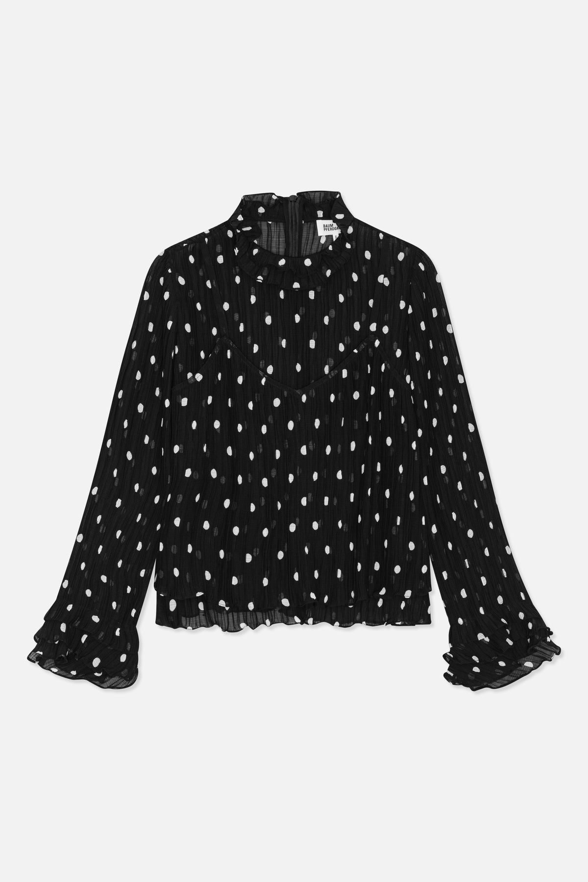 Black sheer, crinkled long-sleeve blouse with white irregular dots, a ruffled high neckline and layered cuffs, shown from the front