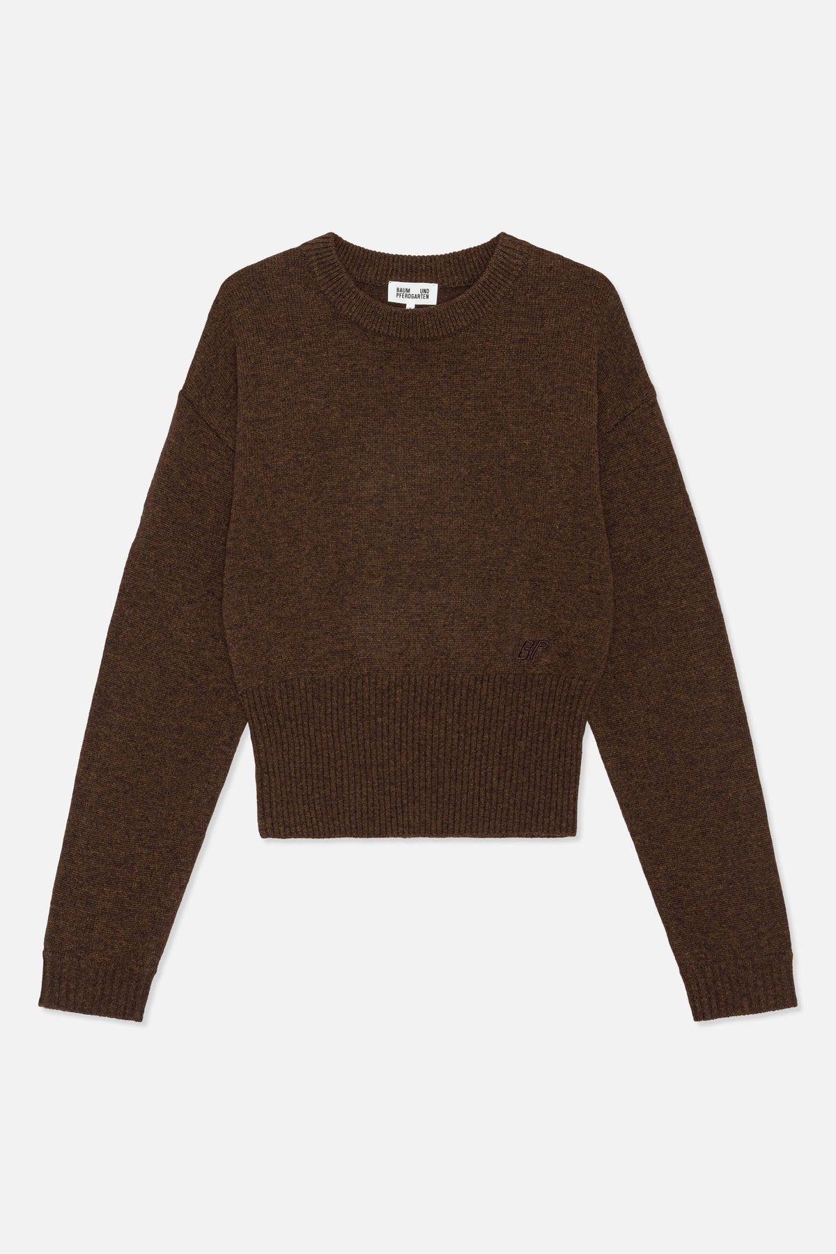 Front view of a dark brown melange knit sweater with a crew neck, long sleeves, ribbed hem and cuffs, and a small chest emblem.