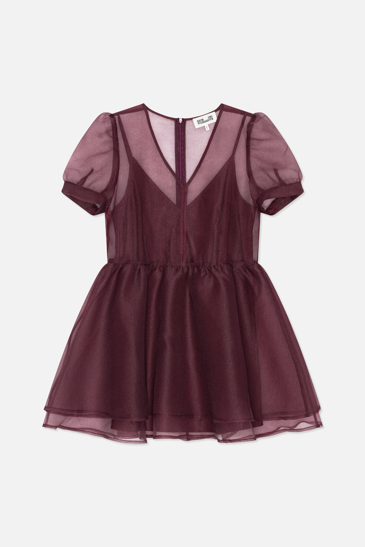 Back view of a burgundy sheer dress with puff sleeves, a centre-back zip, gathered waist and layered flared skirt.