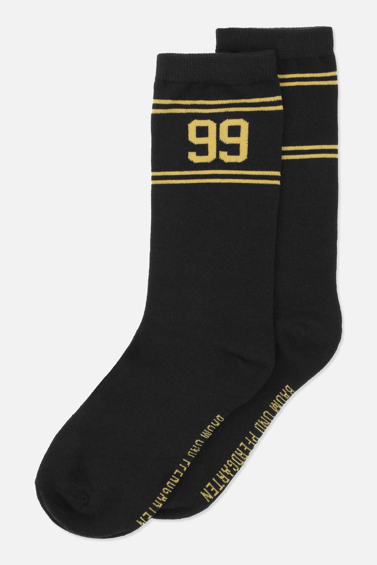 Pair of black crew socks with yellow stripes and a large “99” on one cuff, shown at an angle.