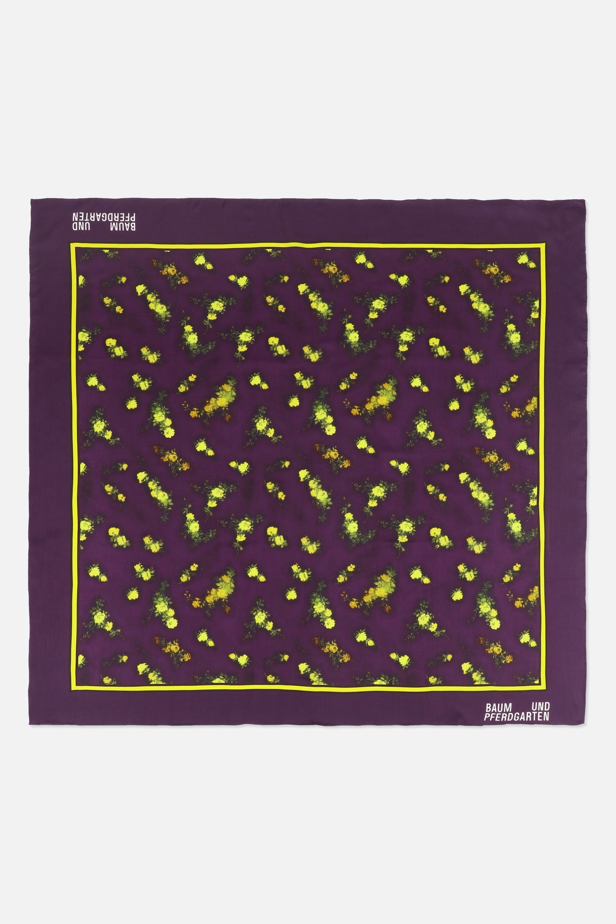 Square purple scarf with scattered yellow floral print, a bright yellow border and Baum und Pferdgarten lettering.